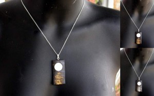'moon over the water'. ebony, bone, sterling and 24ct gold leaf. changing the findings and chain to 9ct gold and will then be SOLD :)