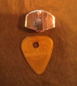 Lucky guitar pick and machine head