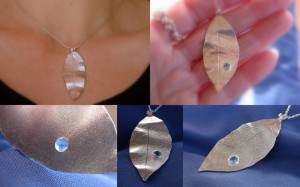 Leaf and blue topaz dew drop pendant. SOLD