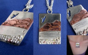 New design in my landscape pendant collection.  Sterling and etched copper.