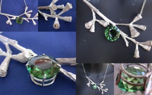 Red gum branch set with a stunningly cut green quartz