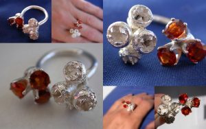 Hessonite and eucalyptus ring.  It was hard to sell this - the hessonite just glows.  Gorgeous.