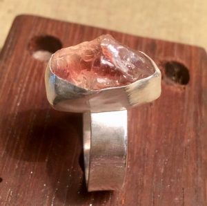 Ring with bezel setting