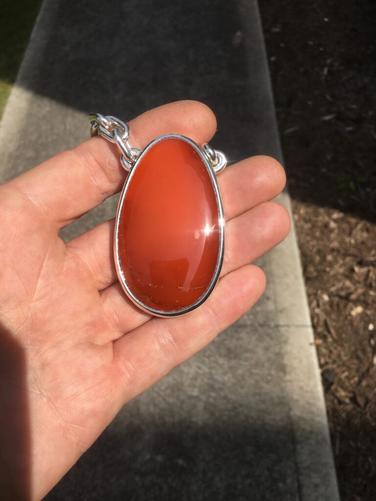 Hand cut Cornelian crystal and sterling silver chain and setting By David Ford